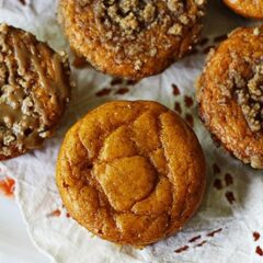 A close up overhead photo of pumpkin mini cakes with cinnamon streusel topping.