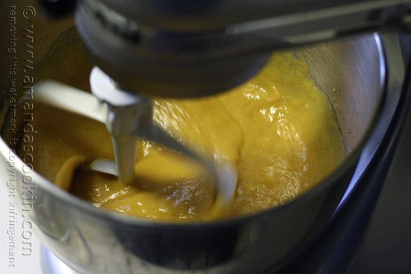 A photo of the cake batter being mixed in a stand up mixer.