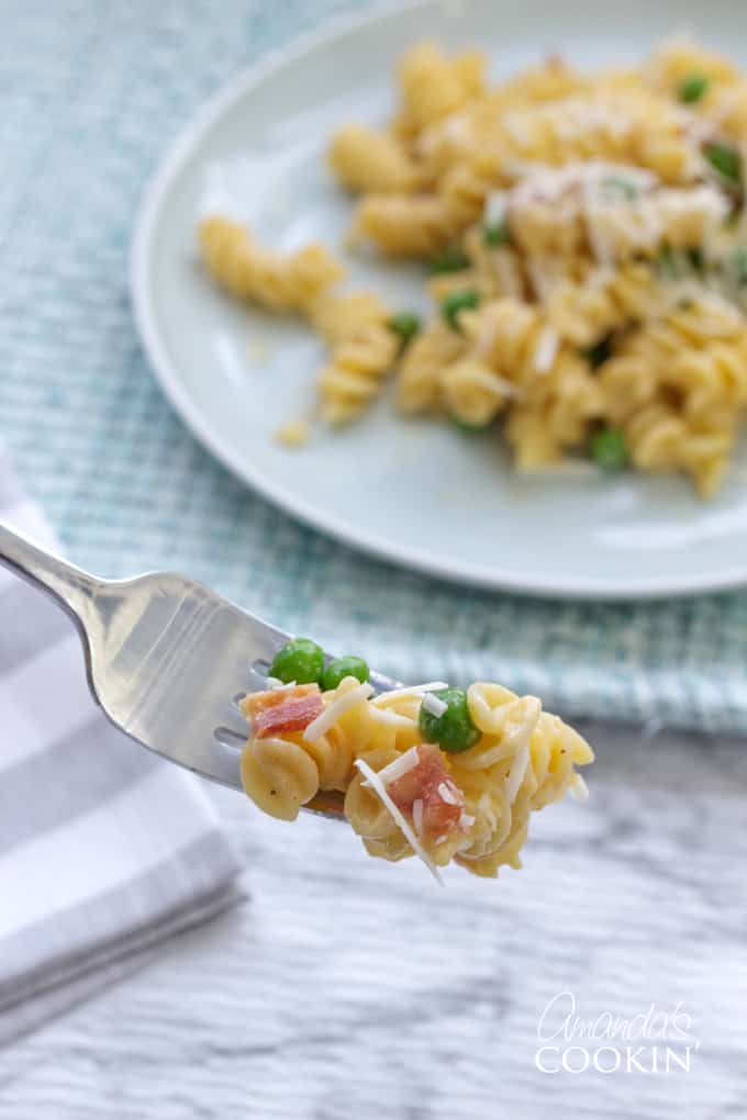 forkful of rotini peas and cheese