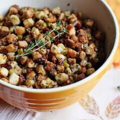 A bowl of stuffing with parsley, sage, rosemary and thyme.
