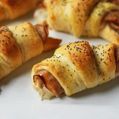 A close up of turkey pepper jack roll ups.