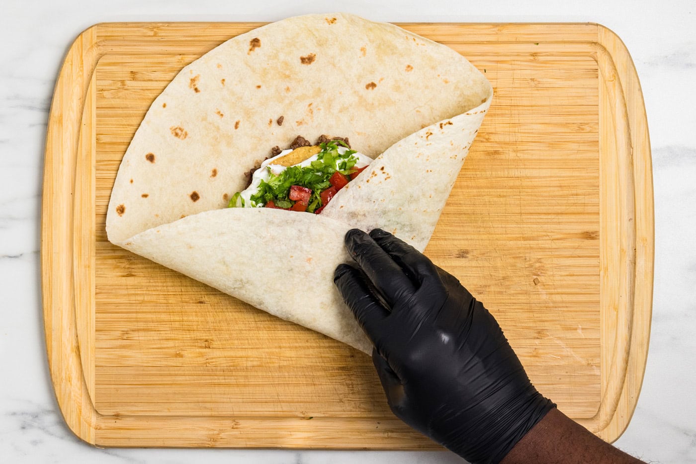 folding Copycat Taco Bell Crunchwrap Supreme