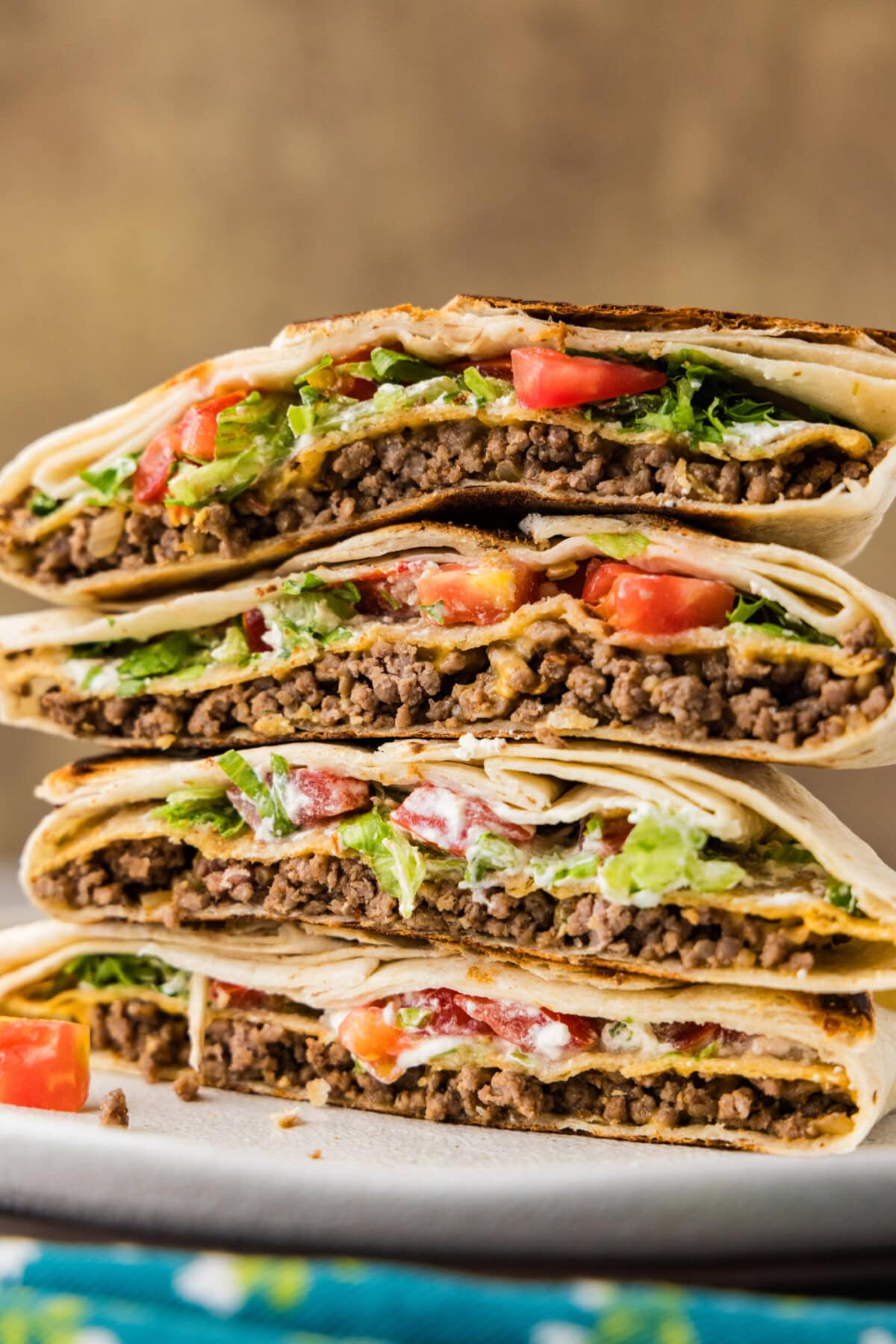 stack of sliced Copycat Taco Bell Crunchwrap Supreme