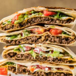 stack of sliced Copycat Taco Bell Crunchwrap Supreme