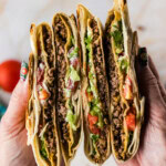 holding Copycat Taco Bell Crunchwrap Supreme