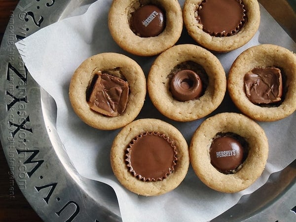 An overhead close up photo of candy bar peanut butter cookie cups.