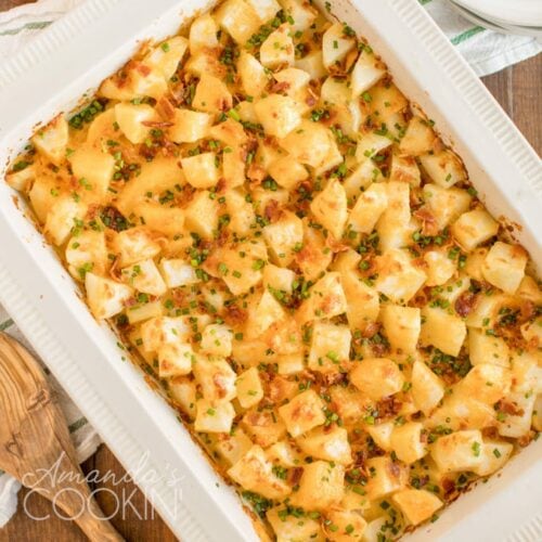 overhead shot of cheese potatoes in a casserole dish