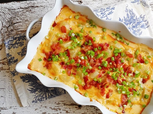 Three Cheese Potatoes: this casserole topped with bacon is amazing!