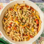 overhead of chicken and peppers pasta in skillet