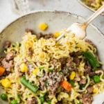 fork lifting some Ramen Noodle Casserole with Ground Beef