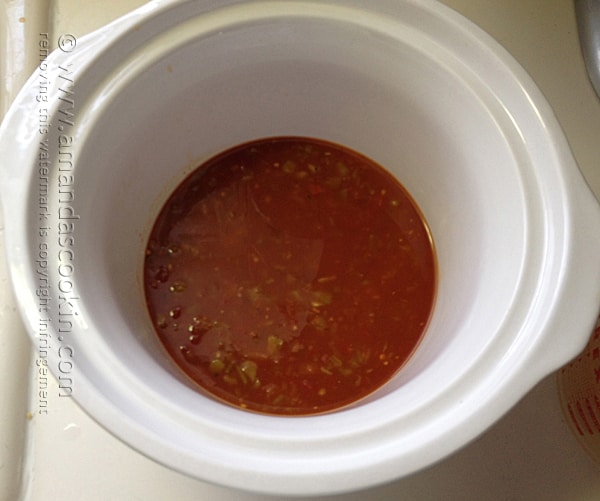 combine salsa, broth and green chiles in crock pot
