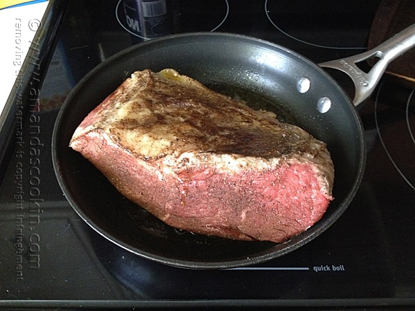 Sear the meat in a skillet of hot oil
