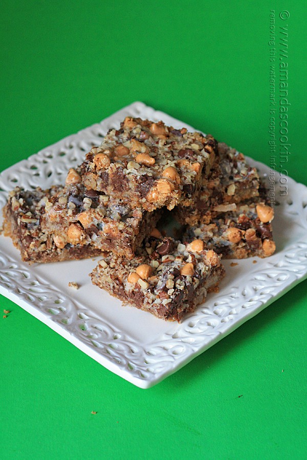 An overhead photo of magic bars resting on a white plate.