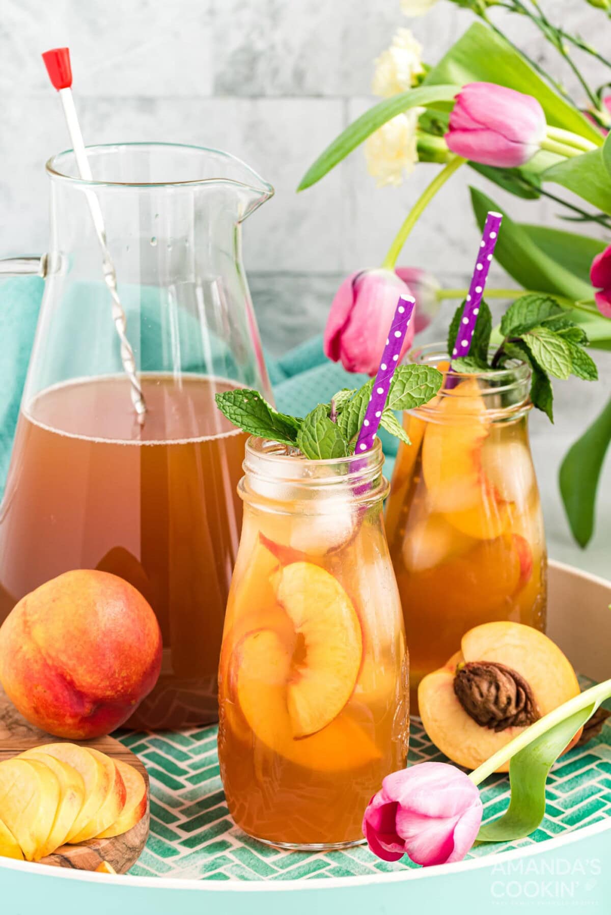 two bottles of peach iced tea