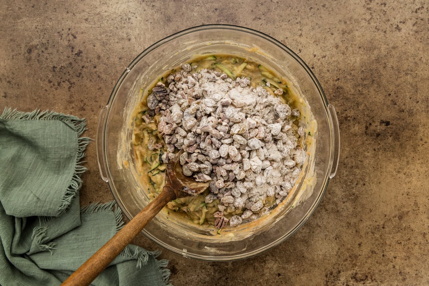 floured raisins added to batter in bowl