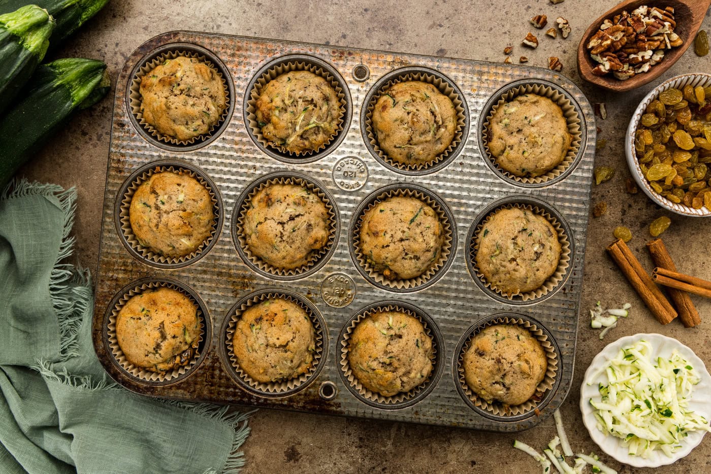 Vanilla Zucchini Muffins in a muffin tin