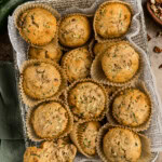 overhead photo of a basket of Vanilla Zucchini Muffins
