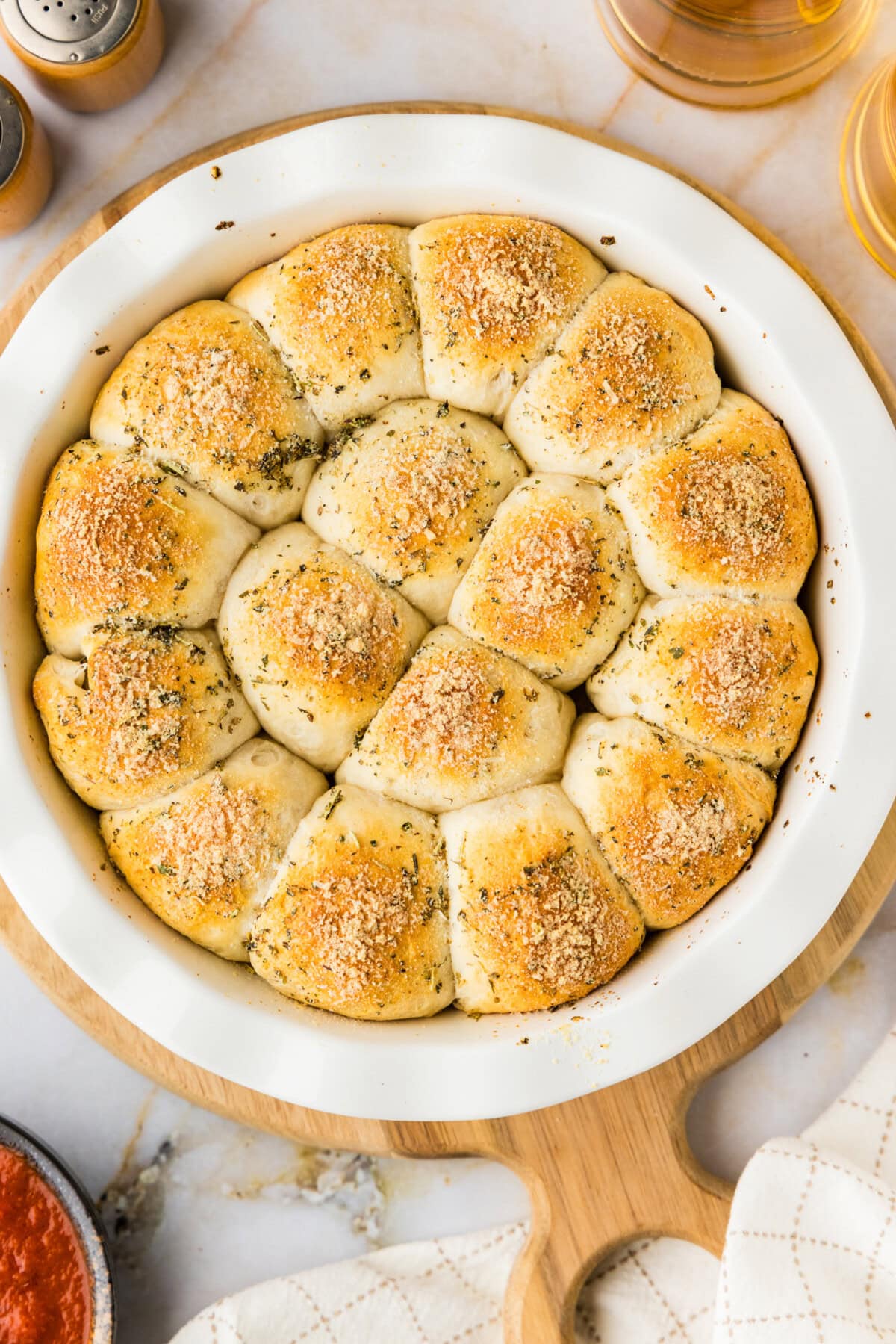 meatball stuffed biscuits in a white pie pan