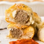 stacked halved meatball stuffed biscuits
