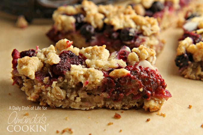 A close up photo of two berrylicious cookie bars.