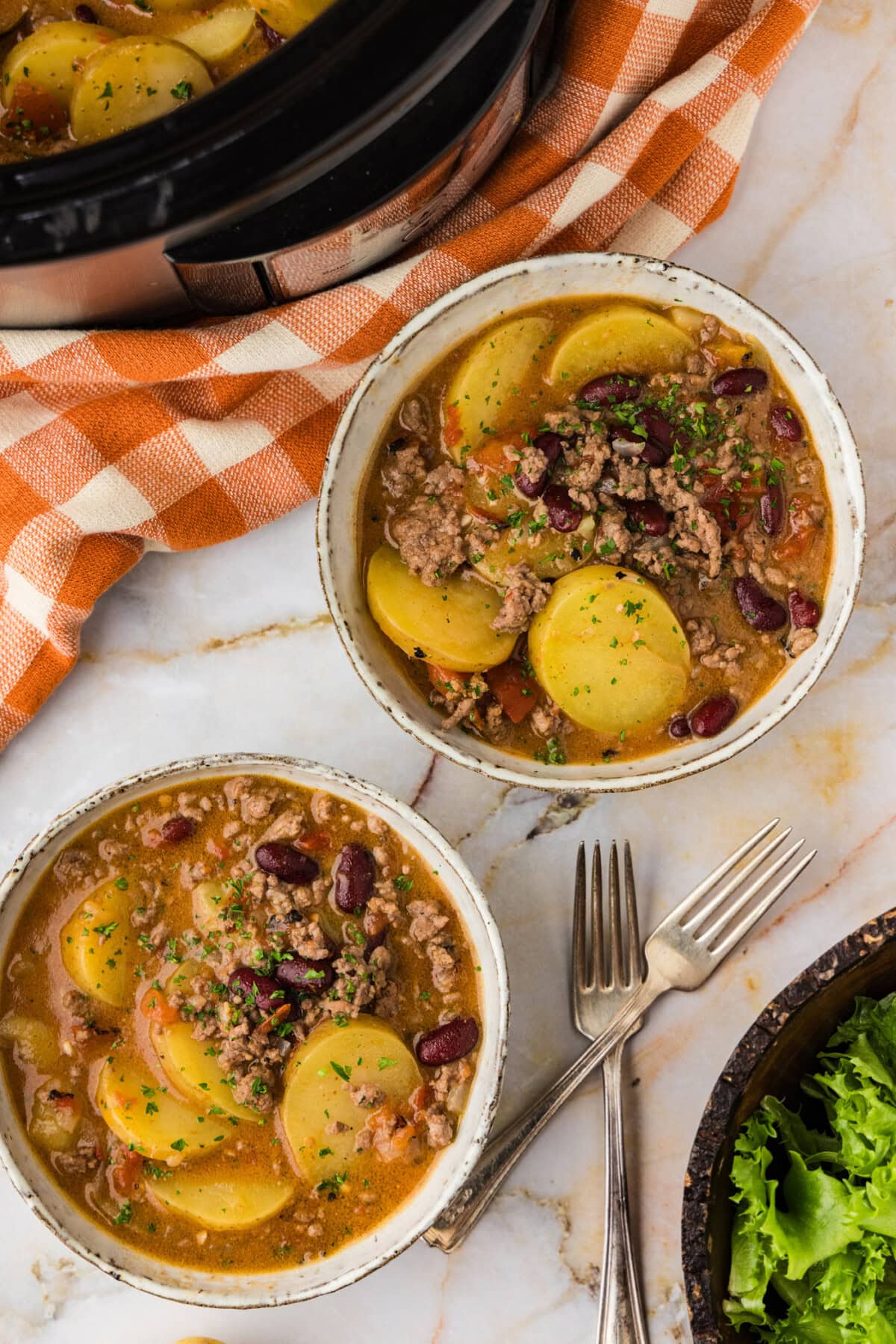 two bowls of Slow Cooker Cowboy Casserole