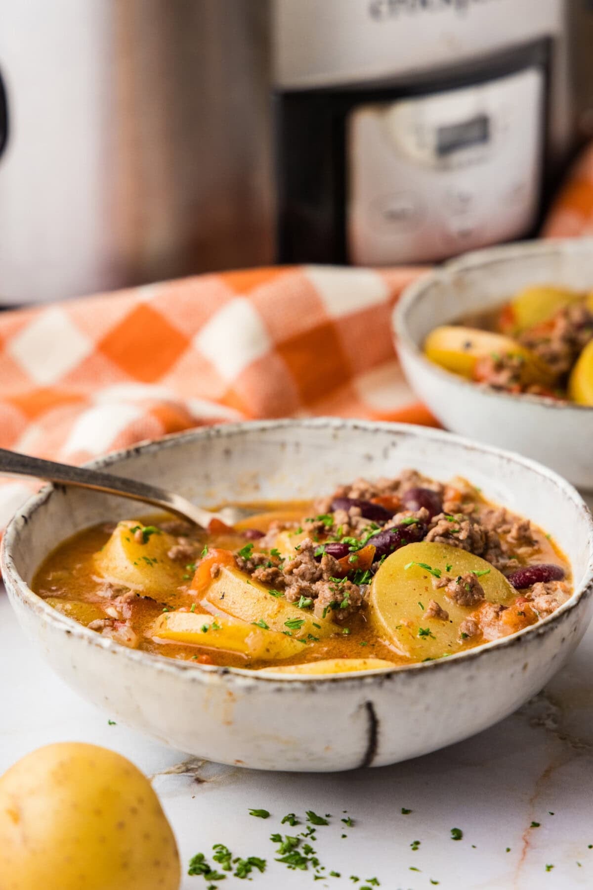 side view of a bowl of Slow Cooker Cowboy Casserole