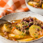 close up of Crockpot Cowboy Casserole in a bowl
