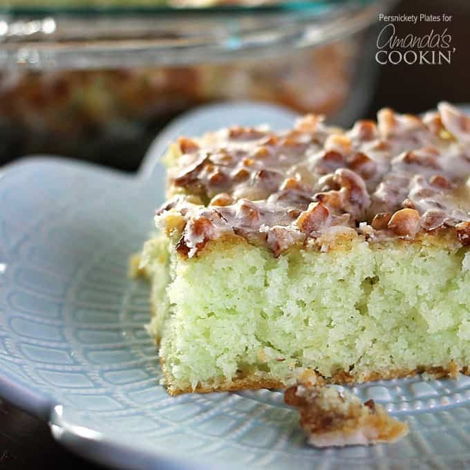 slice of pistachio poke cake on a plate