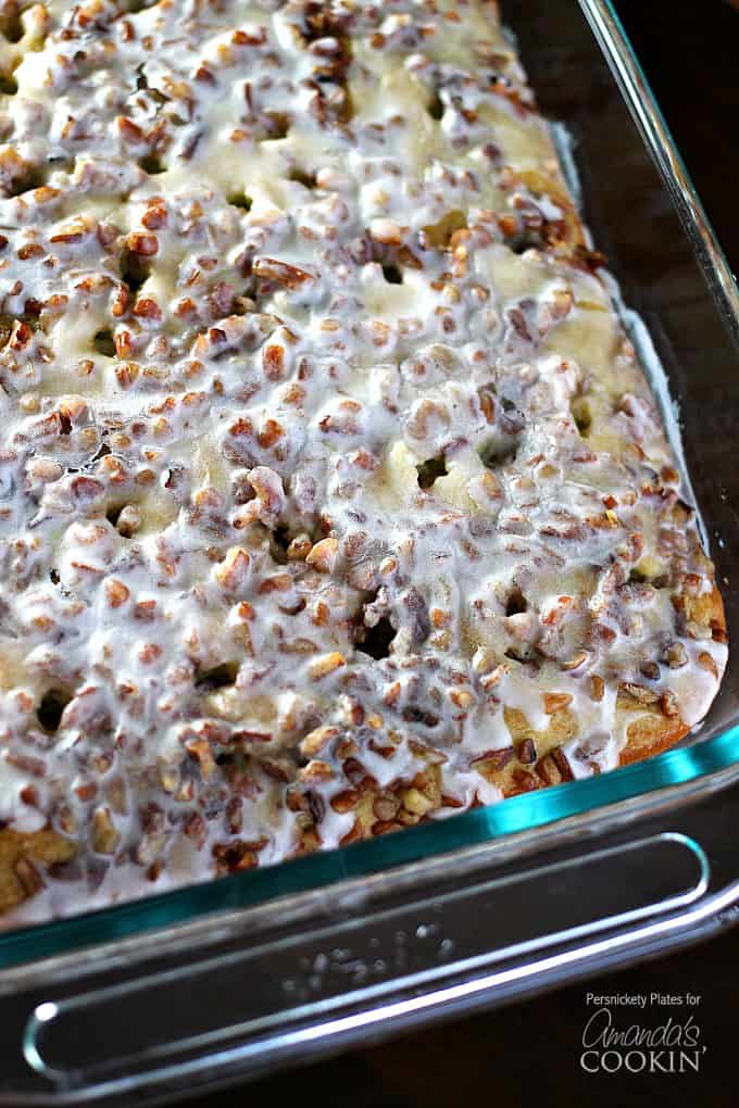 overhead shot of pistachio poke cake in pan