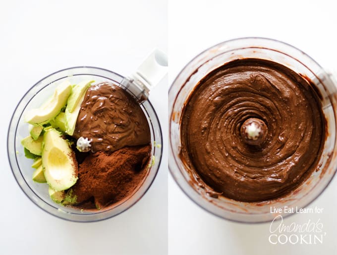 An overhead photo of avocados being added to a food processor of melted chocolate, cocoa powder, coconut cream, vanilla, and salt.