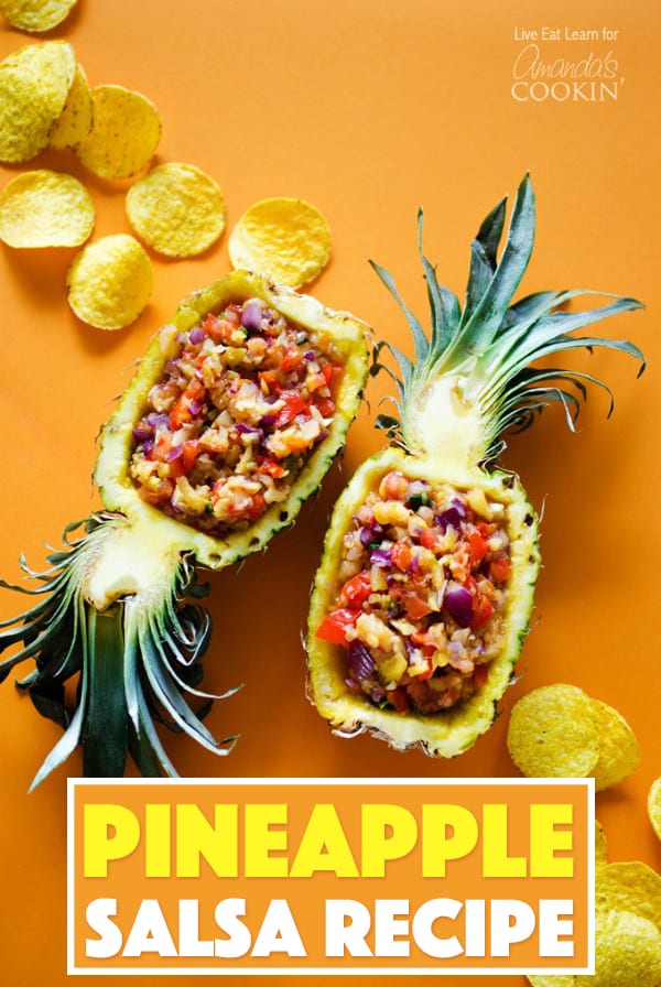 An overhead photo of pineapple salsa served in halved pineapples.