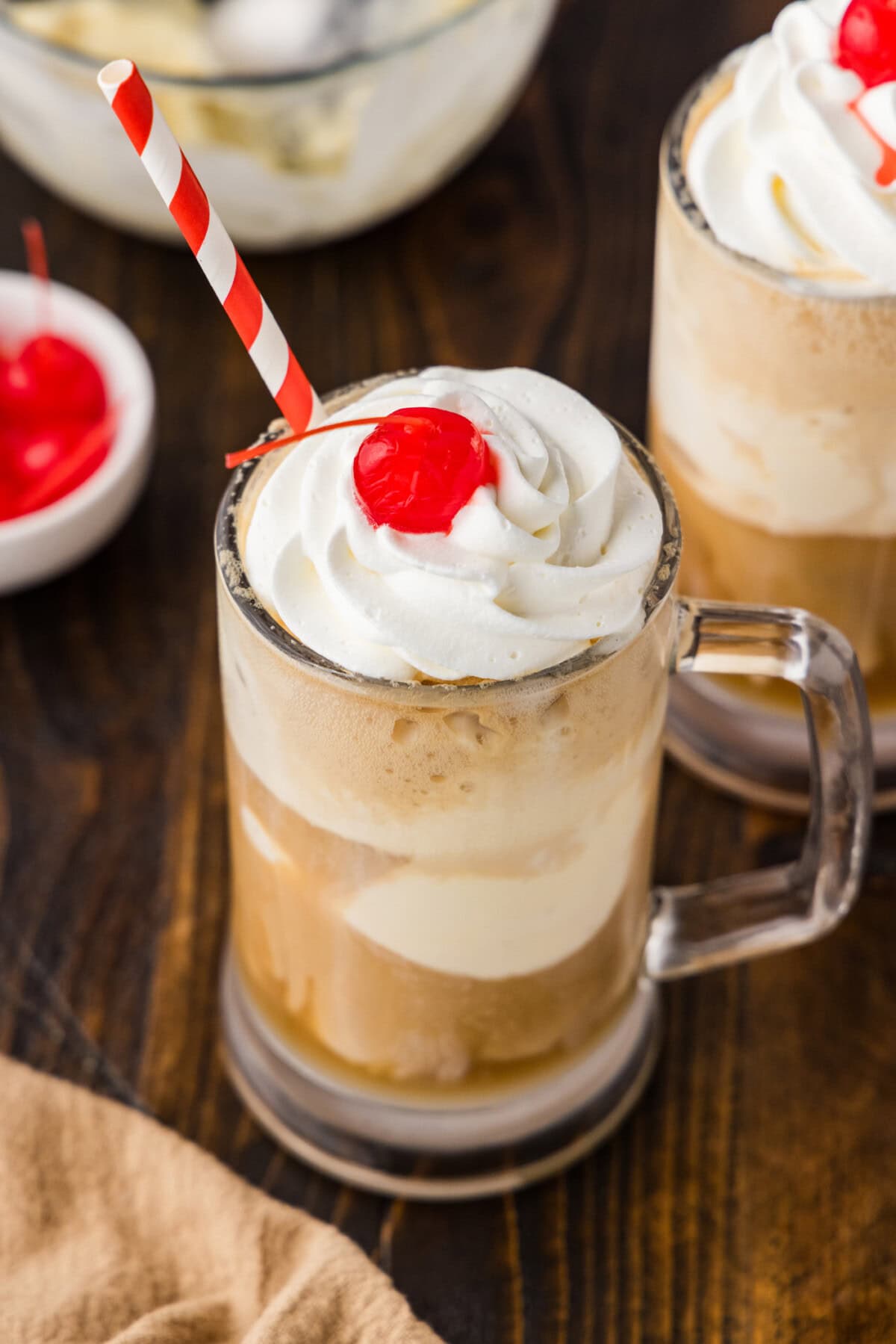Root Beer Float Cocktail  with whipped cream and cherry