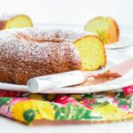 pistachio bundt cake with a slice removed