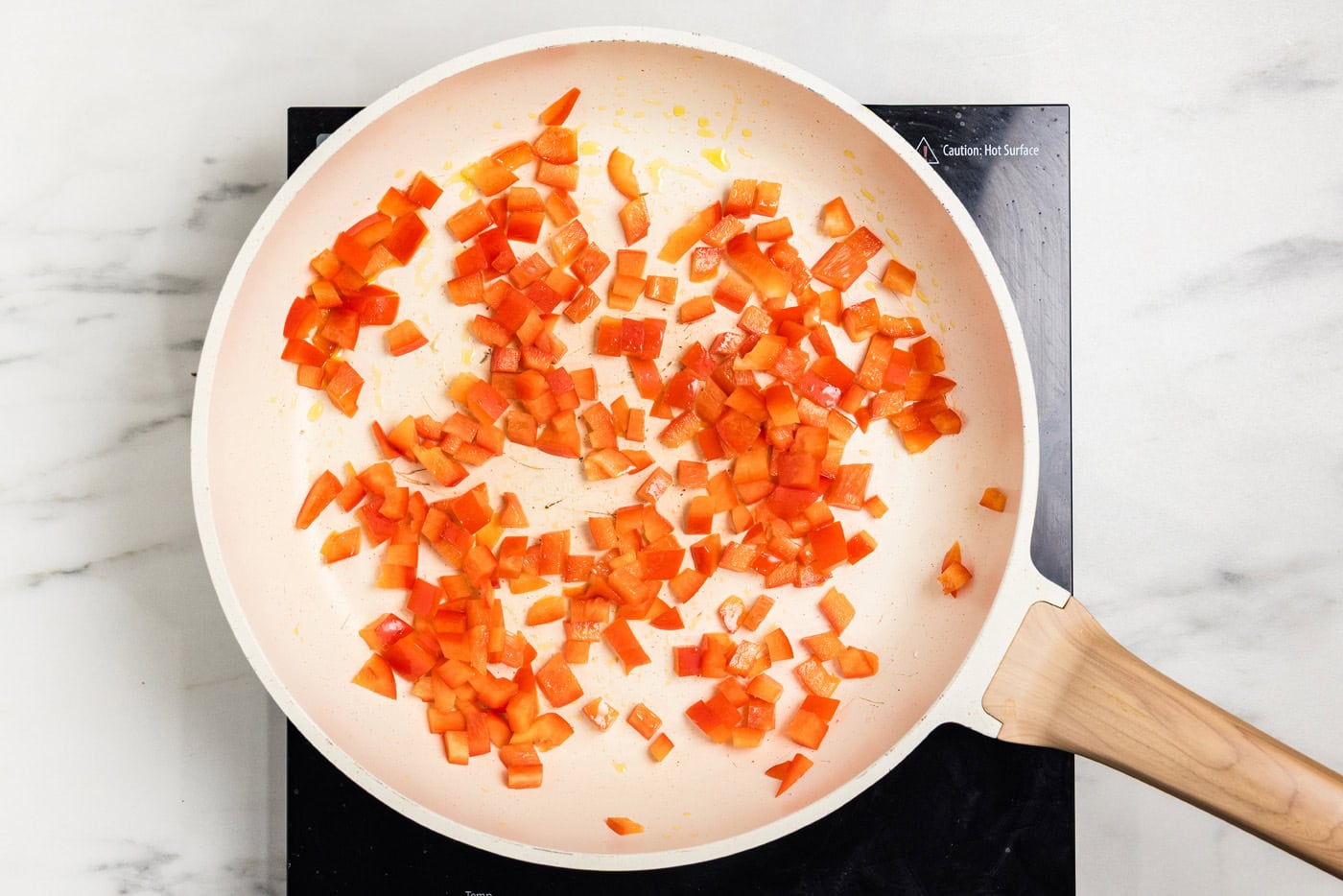 sauteing peppers in skillet