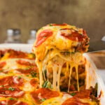 spatula lift shot of pizza lasagna