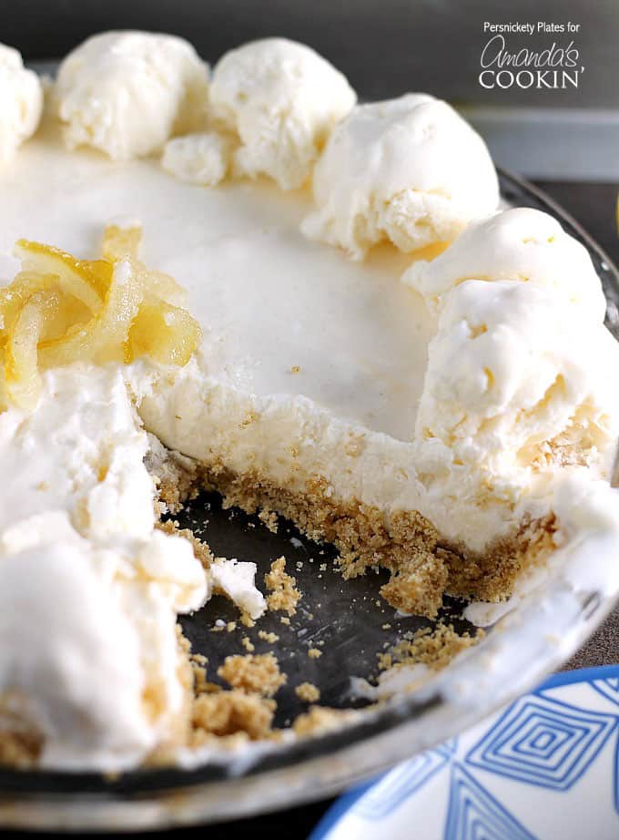 A close up of frozen lemonade pie with a slice missing.
