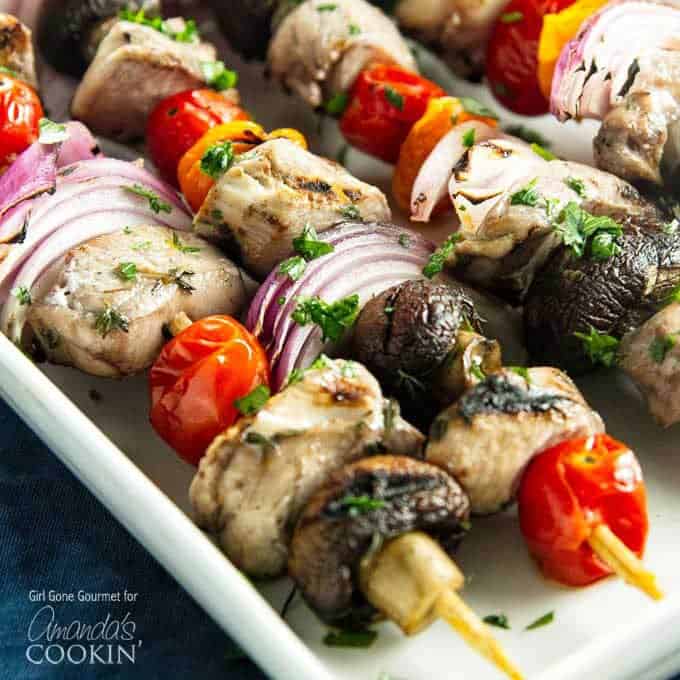 Summer wouldn't be complete without tender, juicy marinated grilled chicken and flavorful mixed vegetables threaded onto skewers, perfect chicken kabobs.