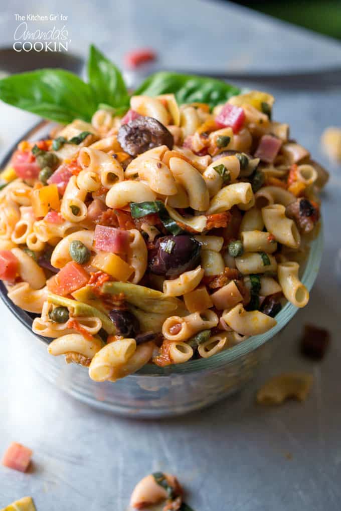 A close up of a bowl filled with Mediterranean pasta salad.