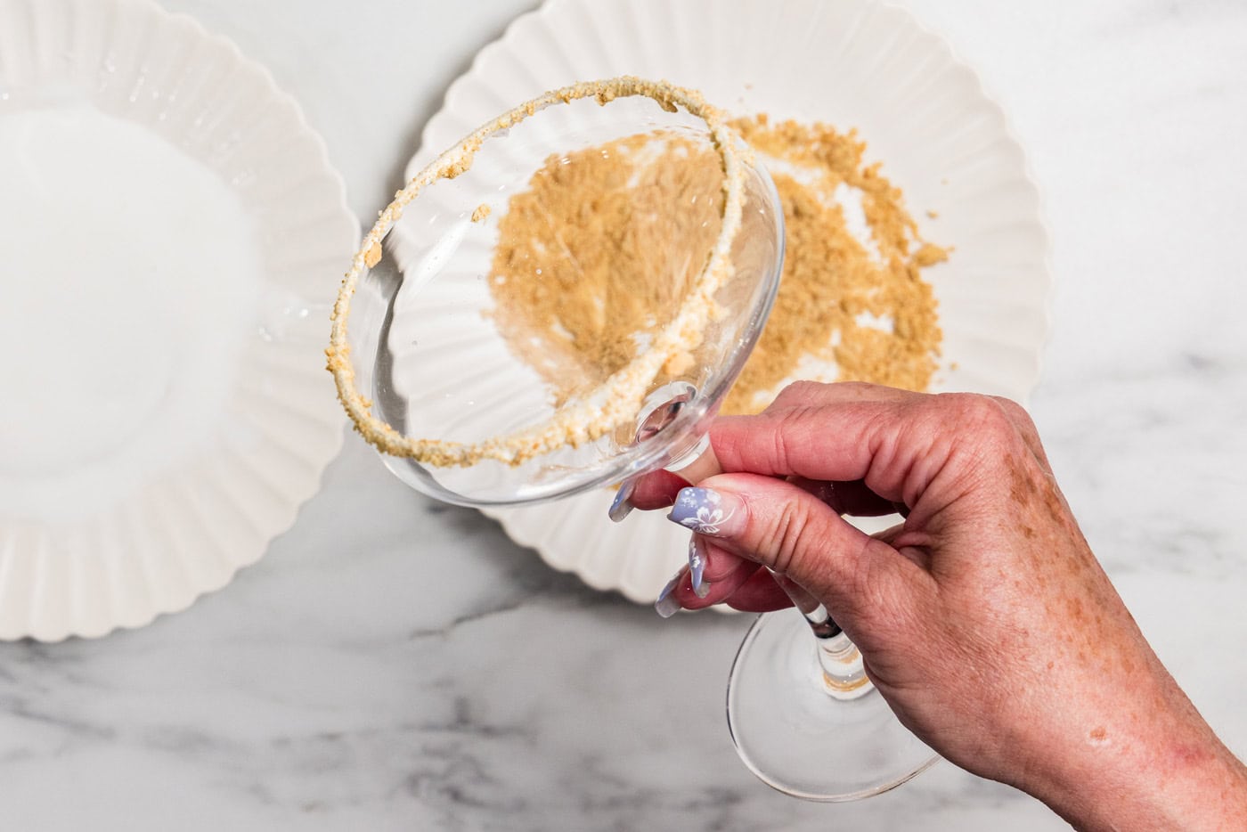 martini glass rim with marshmallow fluff and graham cracker crumbs