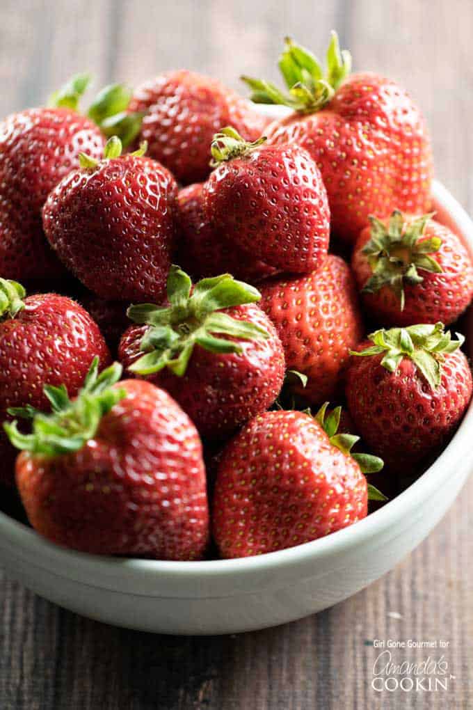 A photo of a bowl of strawberries.