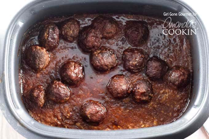 An overhead photo of meatballs in a slow cooker.