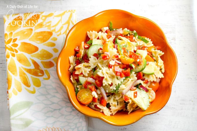 orange bowl with pasta salad