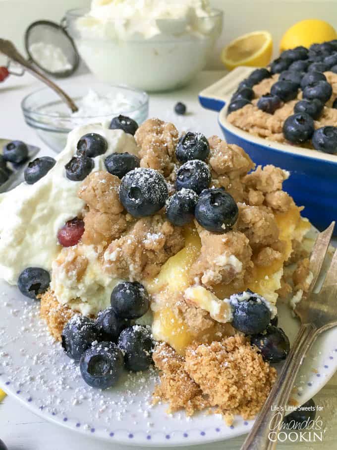 A square of blueberry lemon crumble no bake cheesecake on a plate.