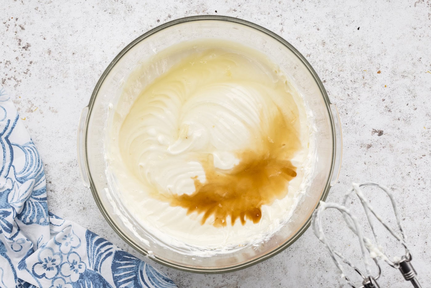 cheesecake ingredients in bowl with vanilla