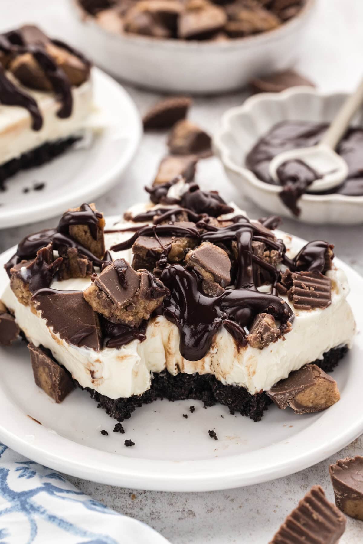 slice of  Peanut Butter Oreo No Bake Cheesecake  on plate