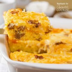 A close up of a square of turkey hash brown breakfast casserole on a spatula.