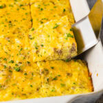 spatula removing Turkey Hash Brown Breakfast Casserole from pan