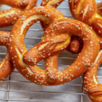homemade german pretzel on wire rack