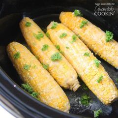 An overhead of corn on the cob in a crockpot.