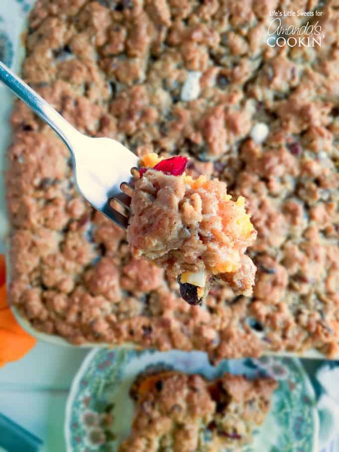 A close up forkful of oatmeal cookie sweet potato casserole.